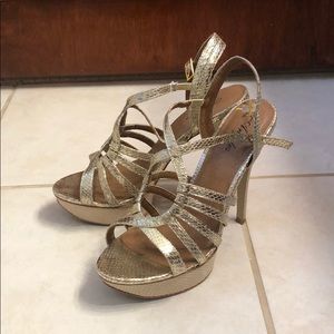 Gold platform heels